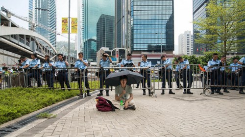 Long protester in Hong Kong takes part in the Umbrella Revolution. Flickr photo by Doctor Ho.