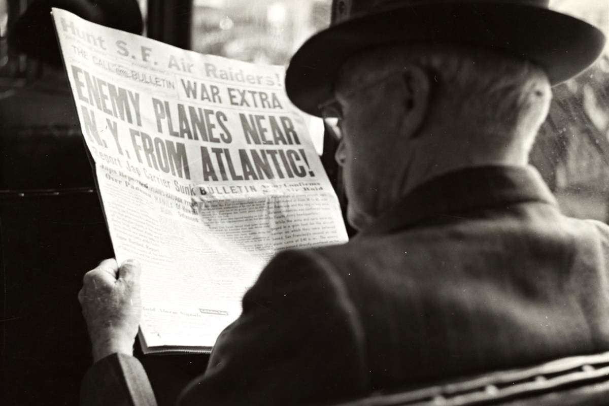 Man with newspaper