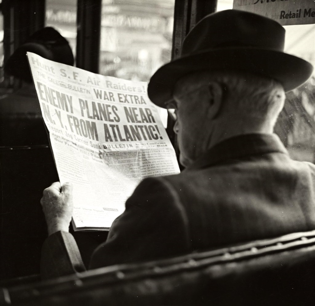 Man with newspaper
